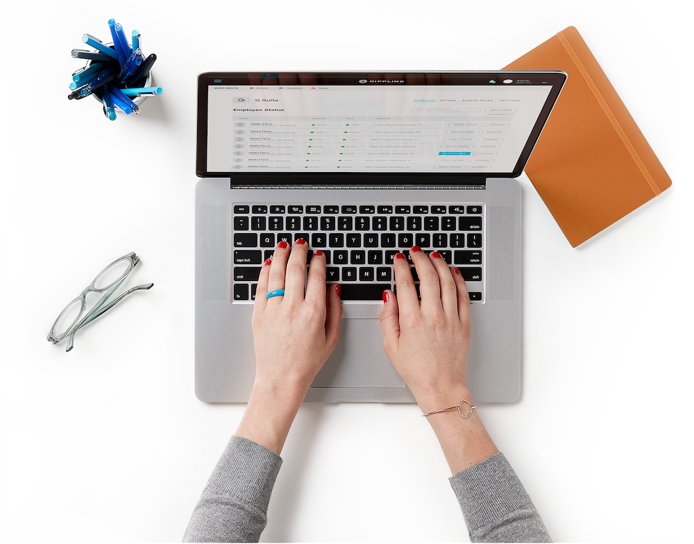 Overhead view of a person working on a laptop